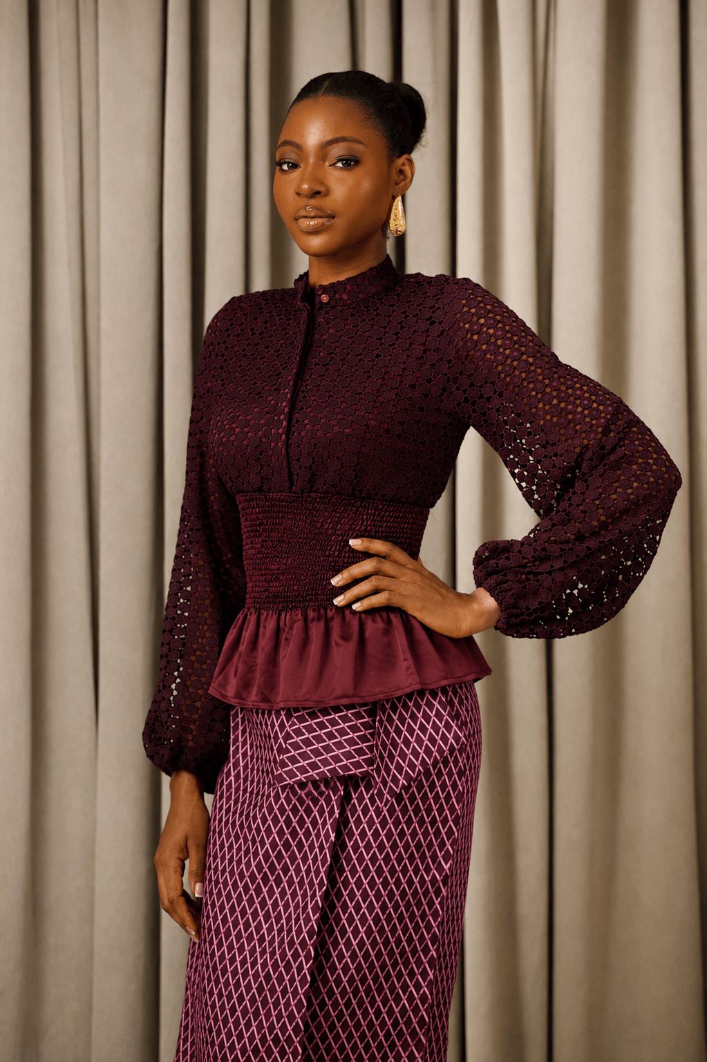 Kwelaku Lace Smocked Peplum Blouse in Plum