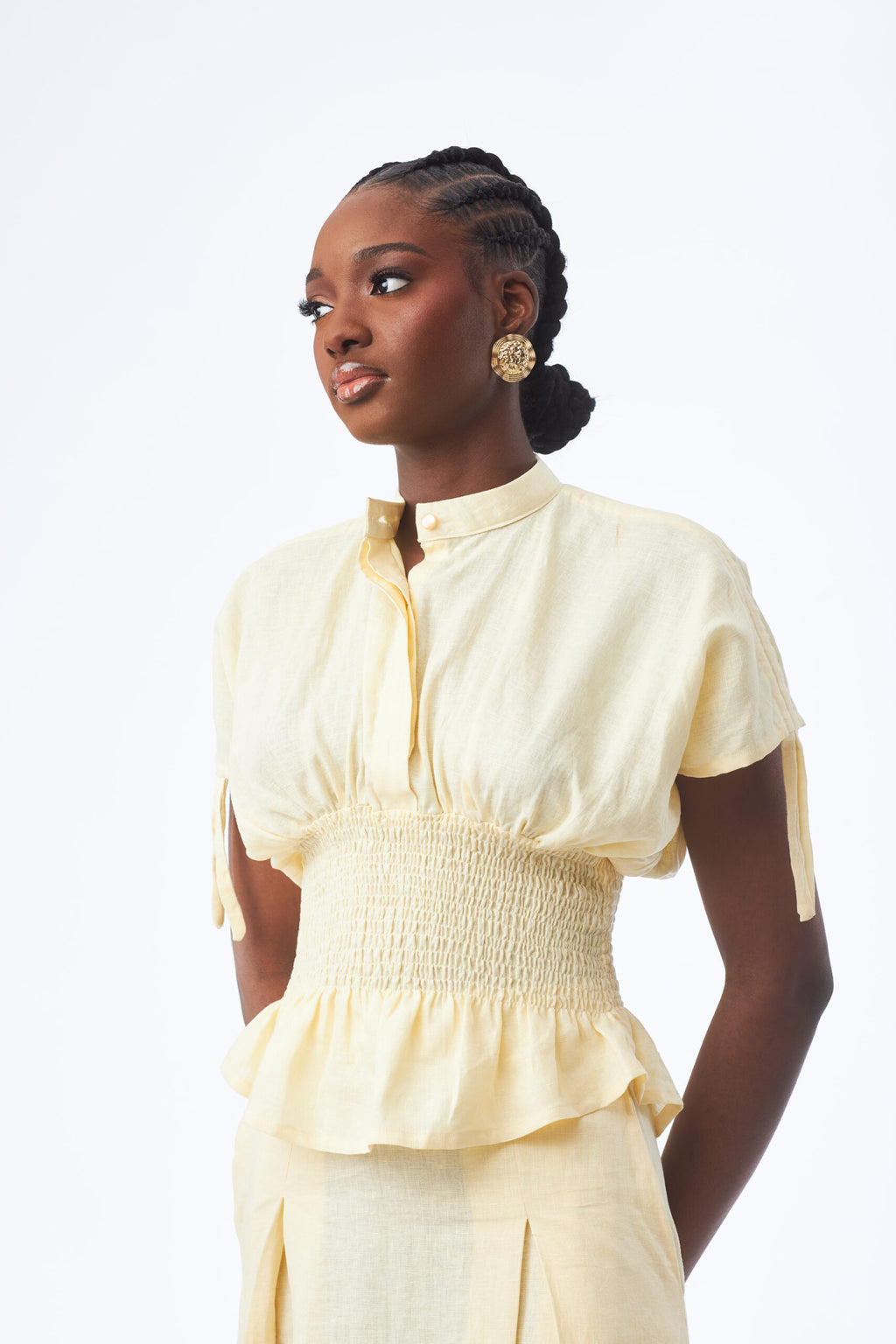 Kwelaku Peplum Blouse — Kwelaku